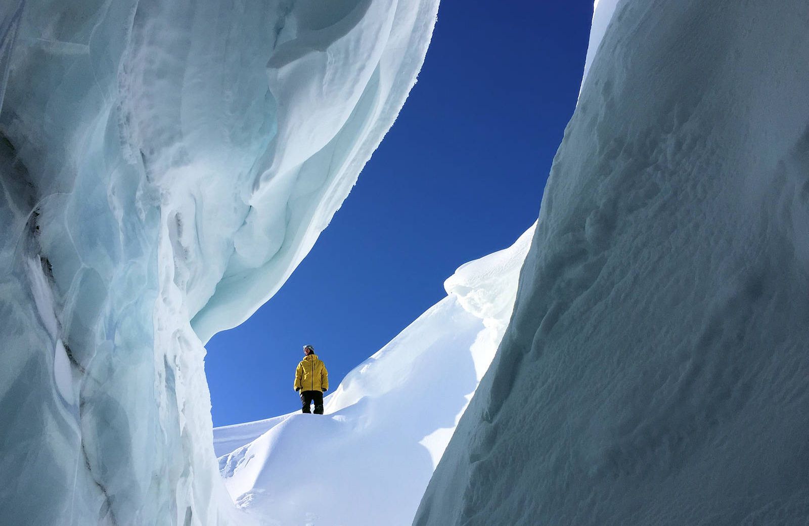 snowboarder on the edge of a crevasse